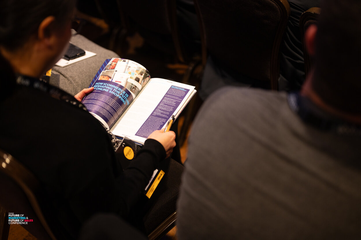 a person reading a magazine